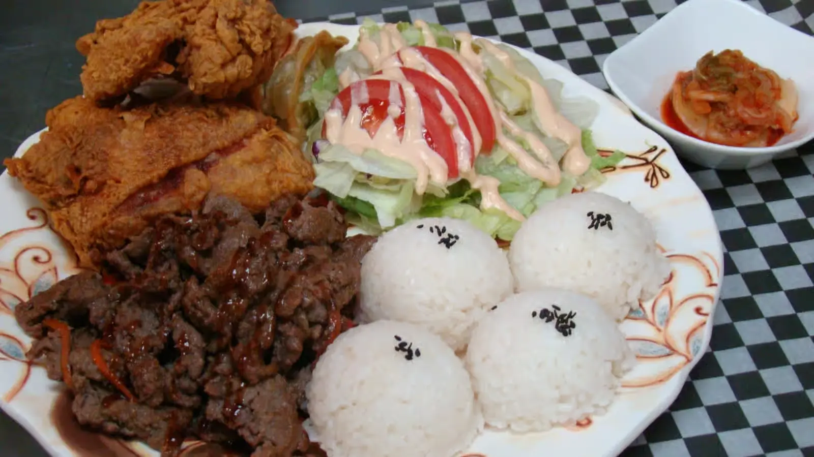 BBQ Plate - Korean BBQ pork and beef with fried chicken rice and dumplings at Yum Yum BBQ Chicken NE Calgary